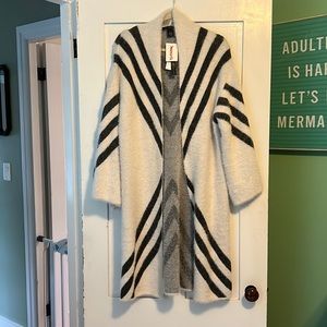 Large white and grey sweater